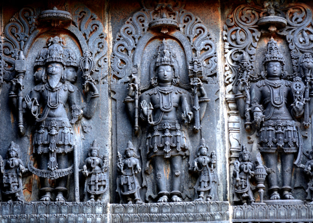 trimurti at Hoysaleswara Temple, Halebeedu
